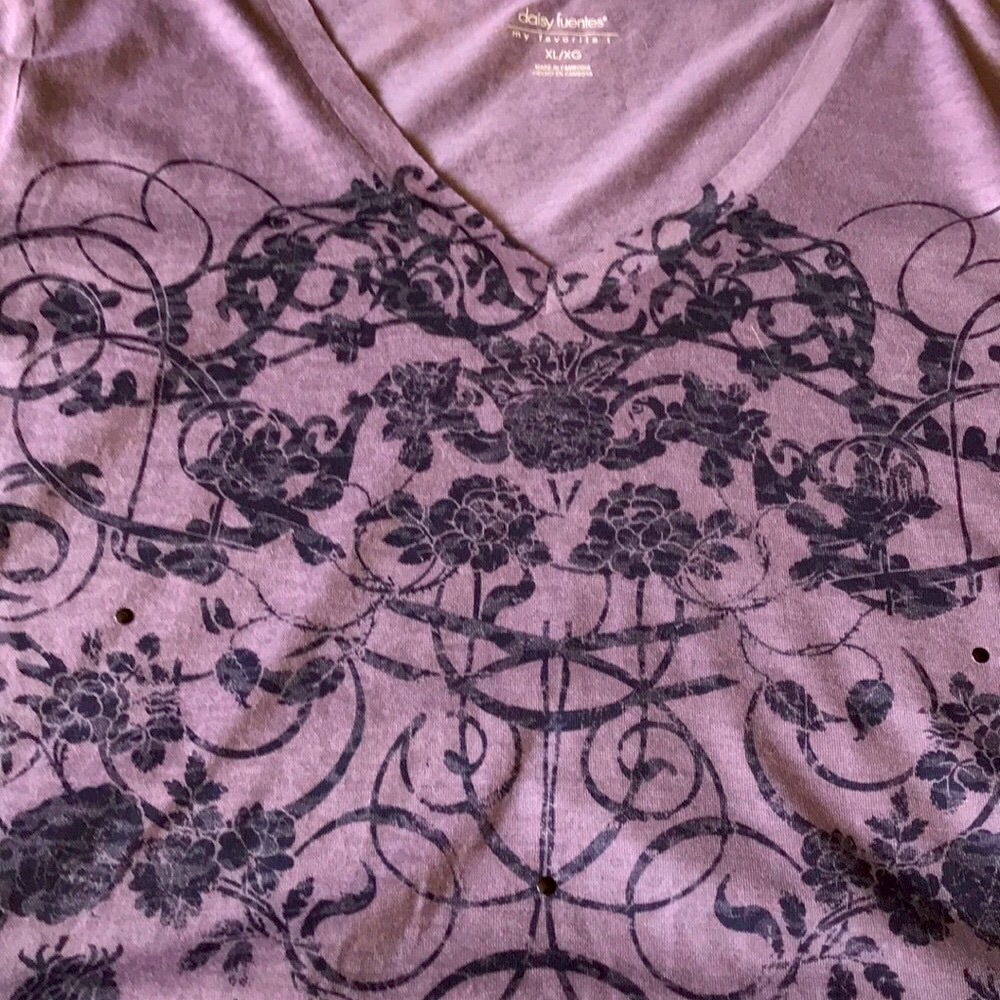 Tee with nice drape and burn out design. In purple